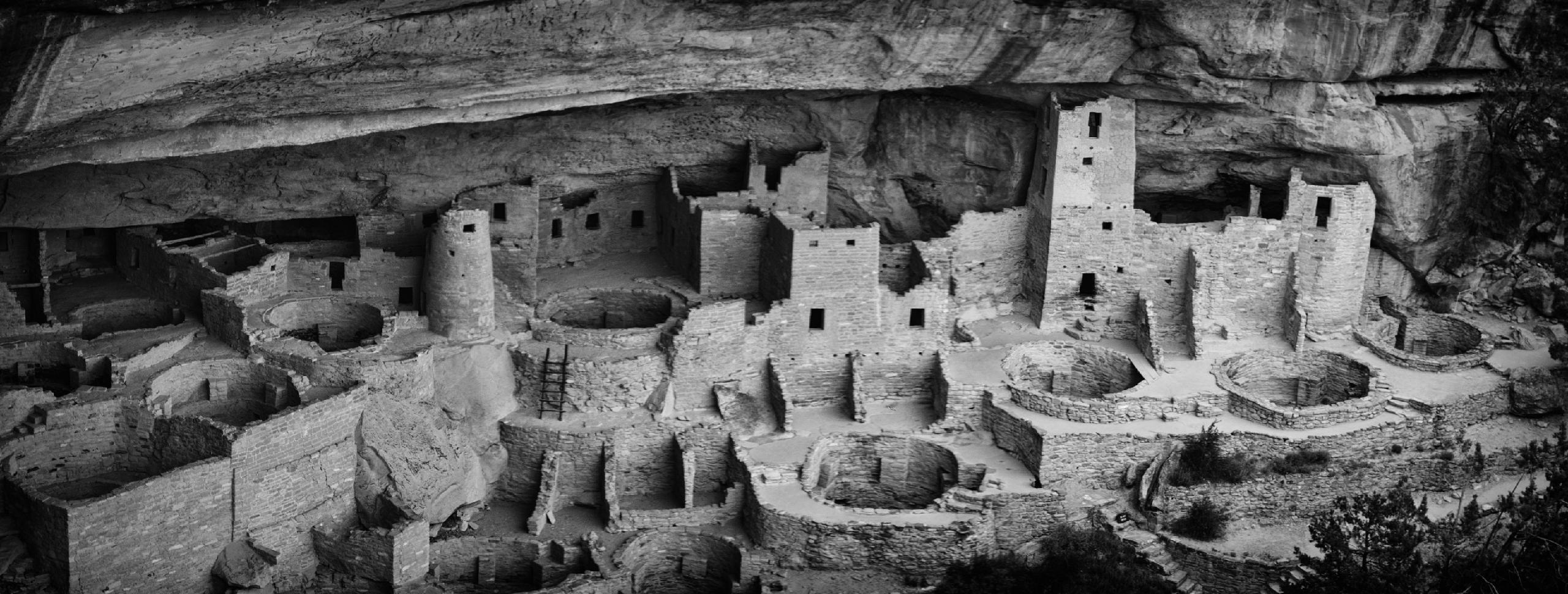 A black and white photo of Cliff Palace in Mesa Verde National Park.